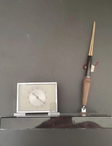 Orologio portapenna - e,